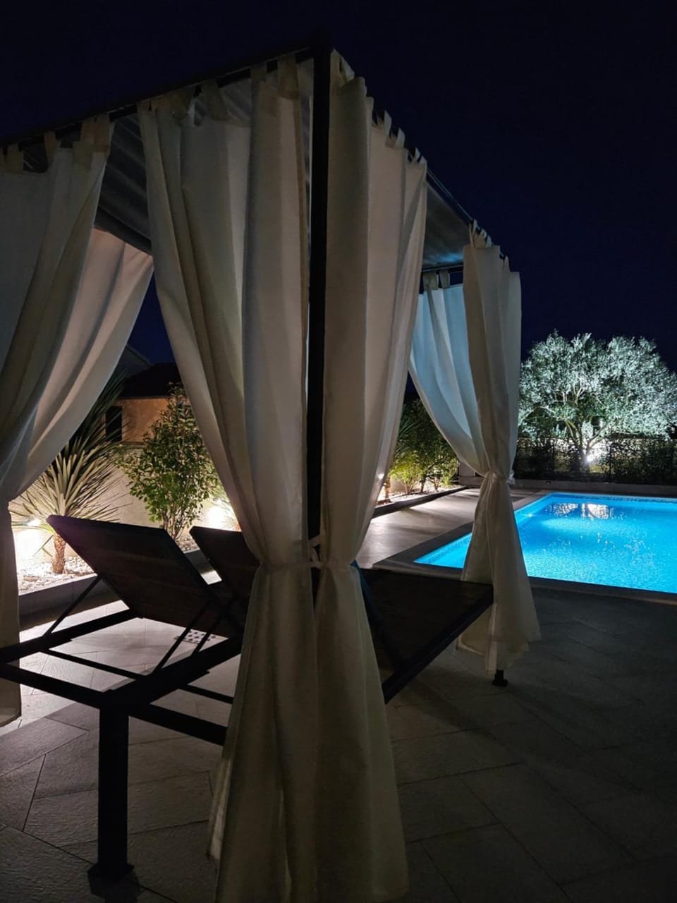 Patio, Natural landscape, Pool view, Swimming pool, sunbed