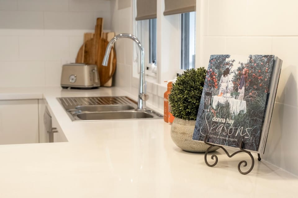 Kitchen or kitchenette, dishwasher, stove, toaster