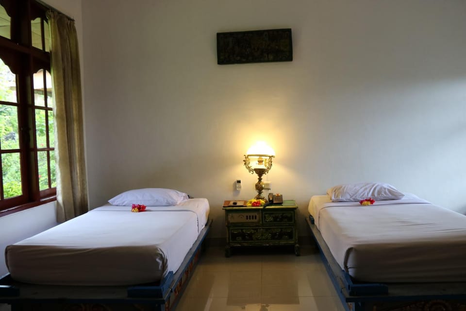 Puri Bunga Beach Cottages Hotel in Batu Layar