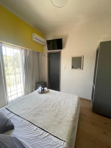 Bed, wardrobe, air conditioner