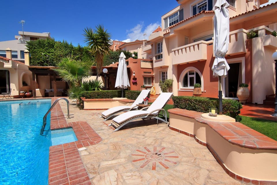 Property building, Patio, Day, Pool view, Swimming pool