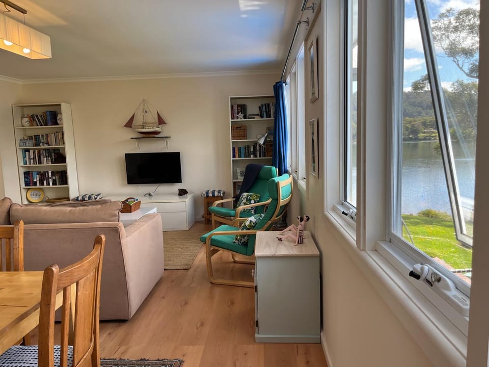 Living room, Dining area, River view