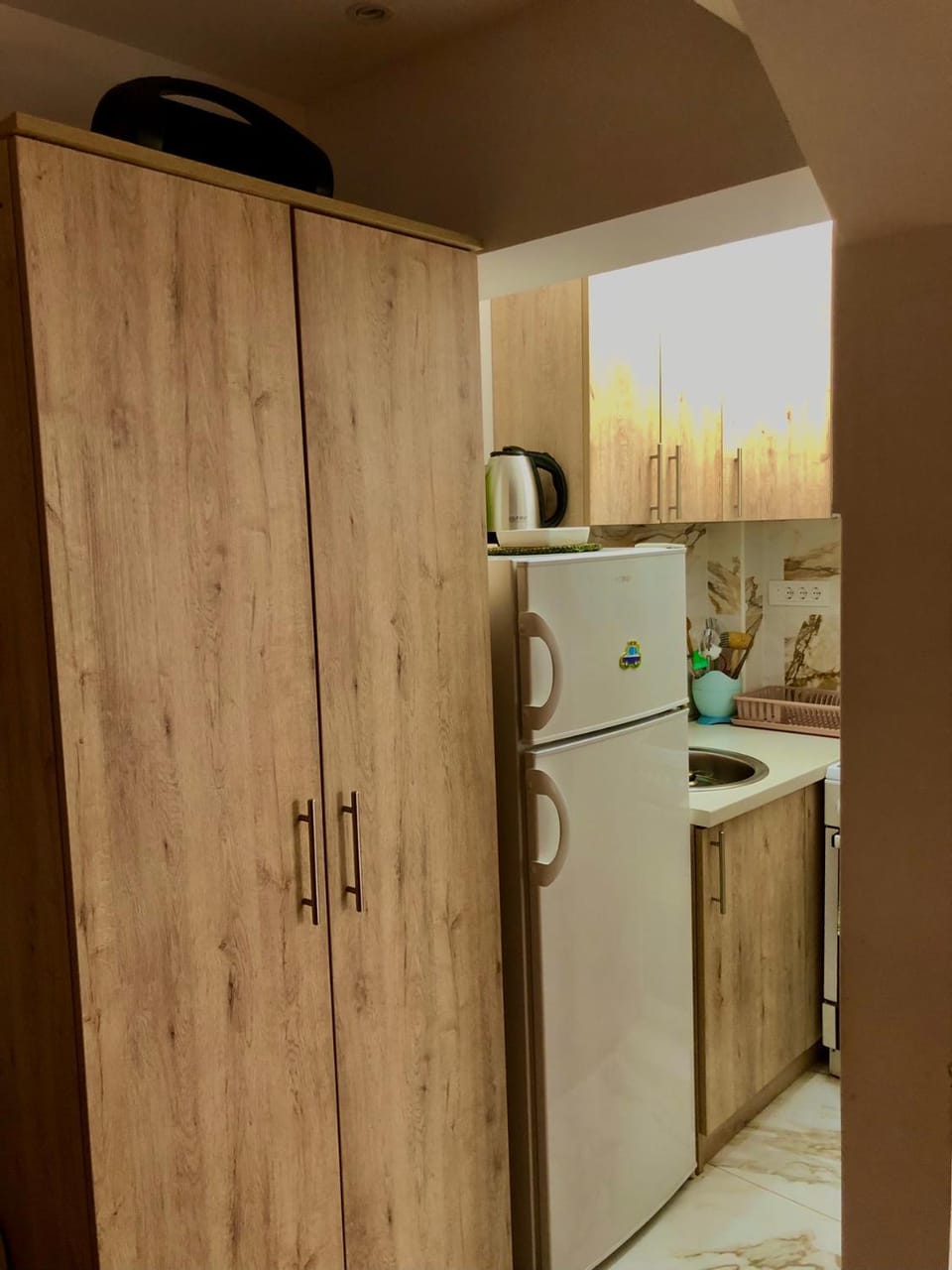 Kitchen or kitchenette, oven, stove, wardrobe