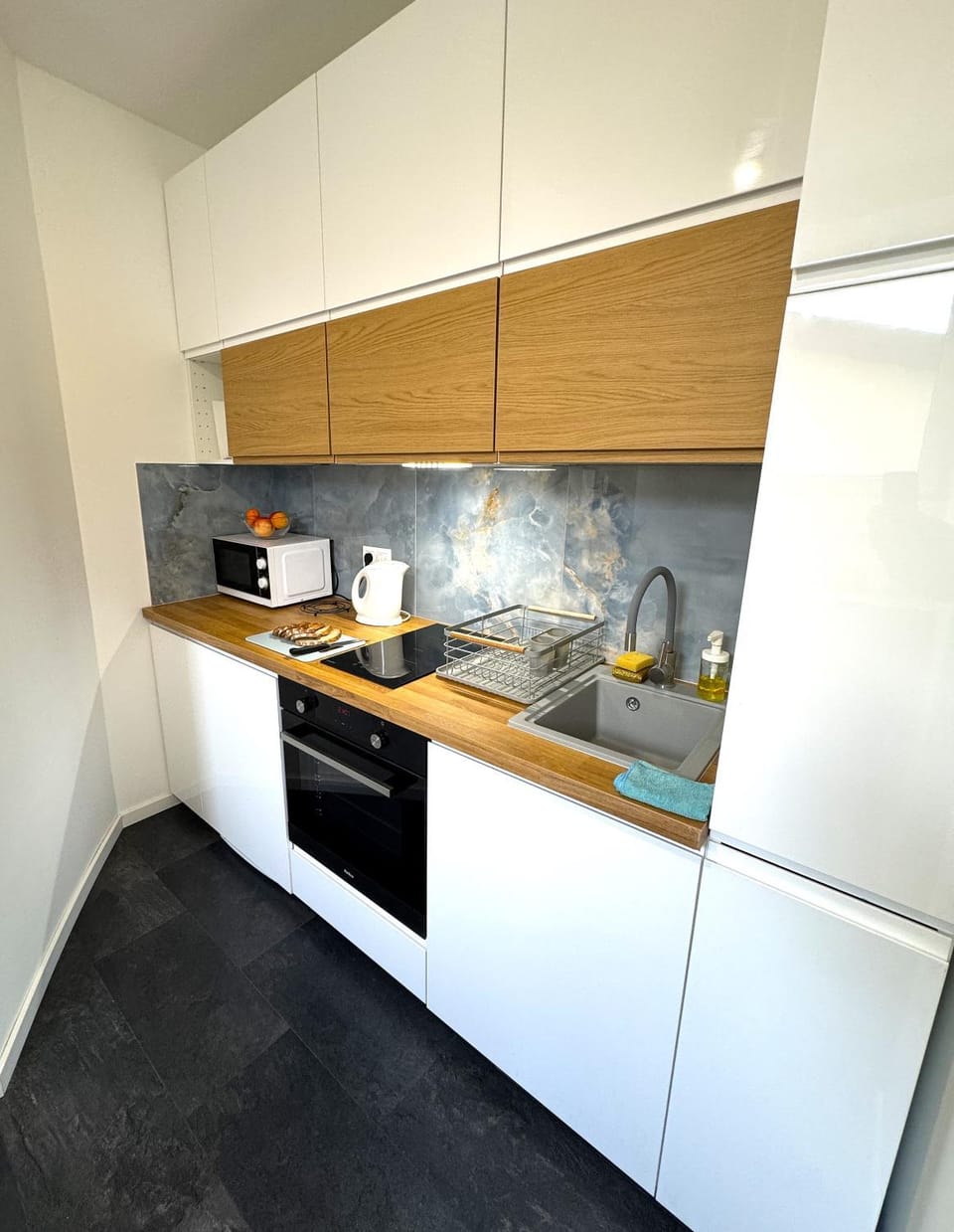Kitchen or kitchenette, dishwasher, oven, stove, toaster