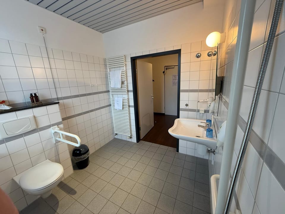 Shower, Bathroom, hair dryier, towels
