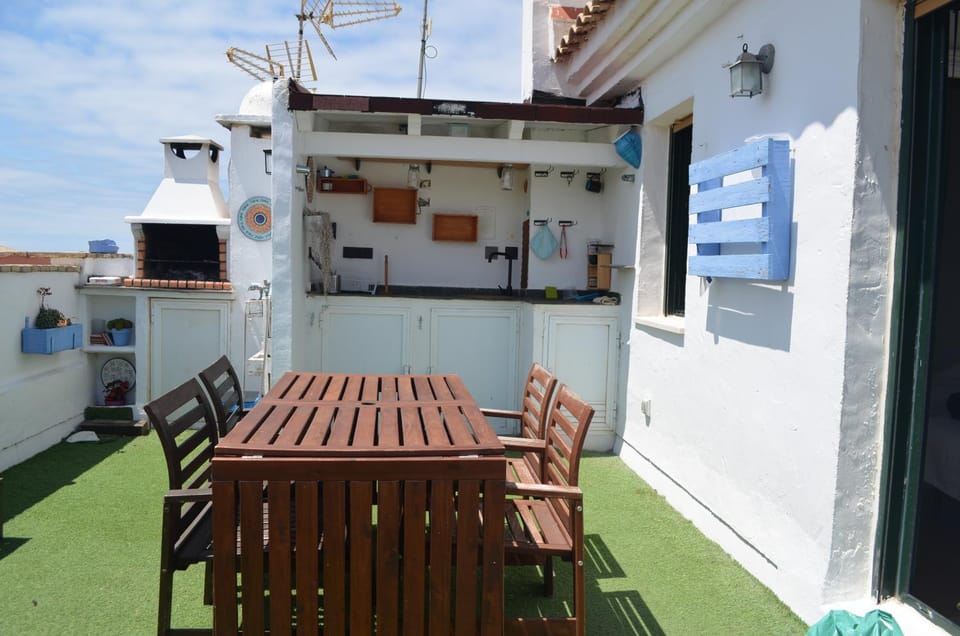 BONITO ÁTICO AIRE ACONDICIONADO y BARBACOA Apartment in Costa de la Luz