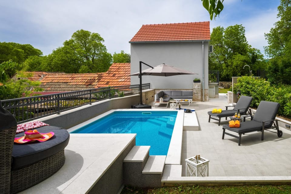 Patio, Day, Natural landscape, Summer, Garden, Seating area, Garden view, Pool view, Swimming pool, sunbed