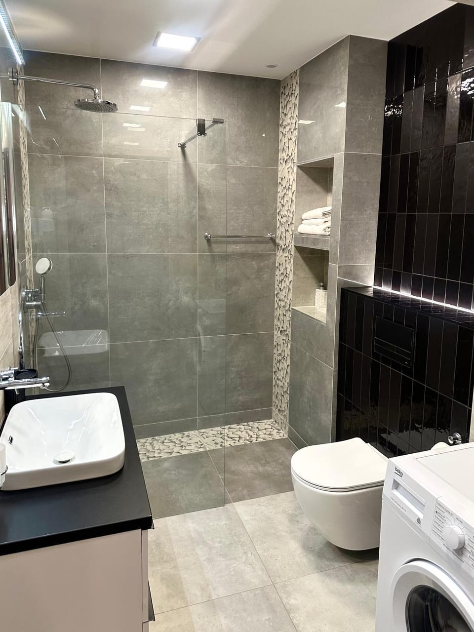 Shower, Toilet, Bathroom, towels, washing machine, dryer