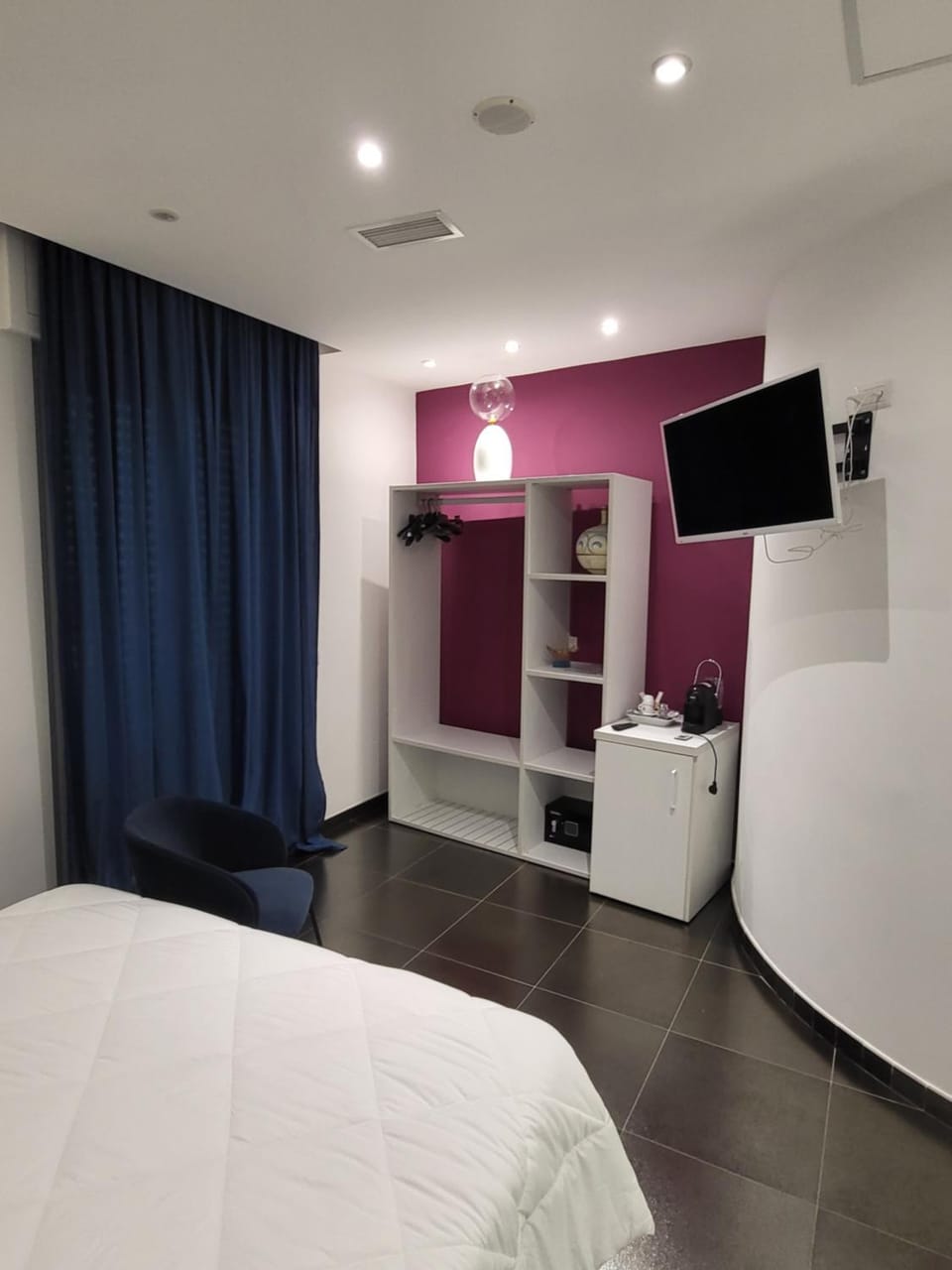 Photo of the whole room, oven, wardrobe, air conditioner