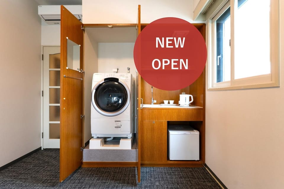 Kitchen or kitchenette, washing machine, dryer