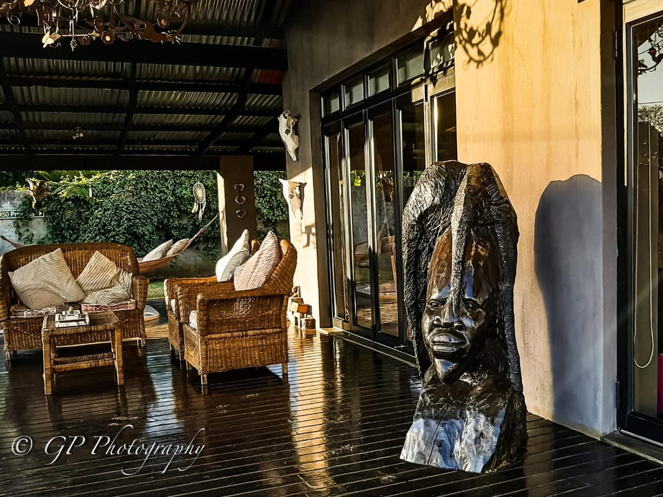 Patio, Facade/entrance, Decorative detail, Seating area, Sunset
