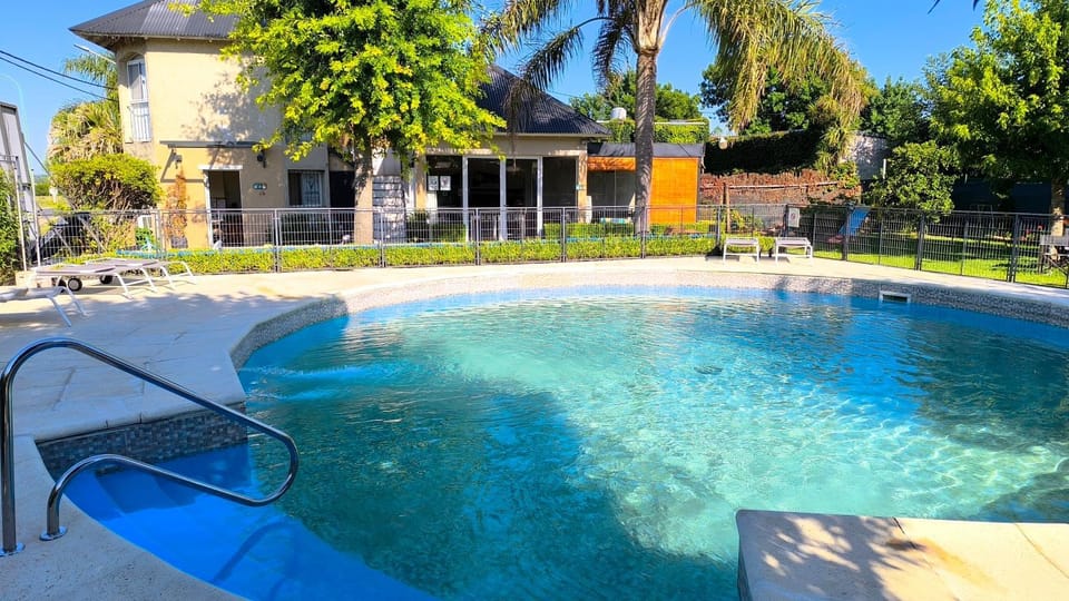 Property building, Patio, Day, Garden, Garden view, Pool view, Swimming pool, sunbed