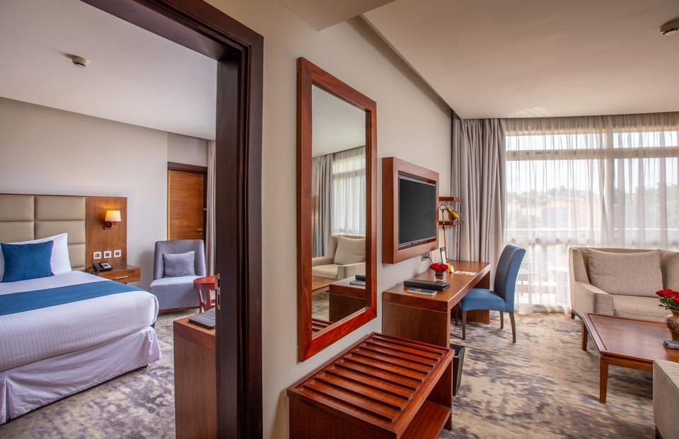 Bed, Living room, Photo of the whole room, Seating area, Bedroom
