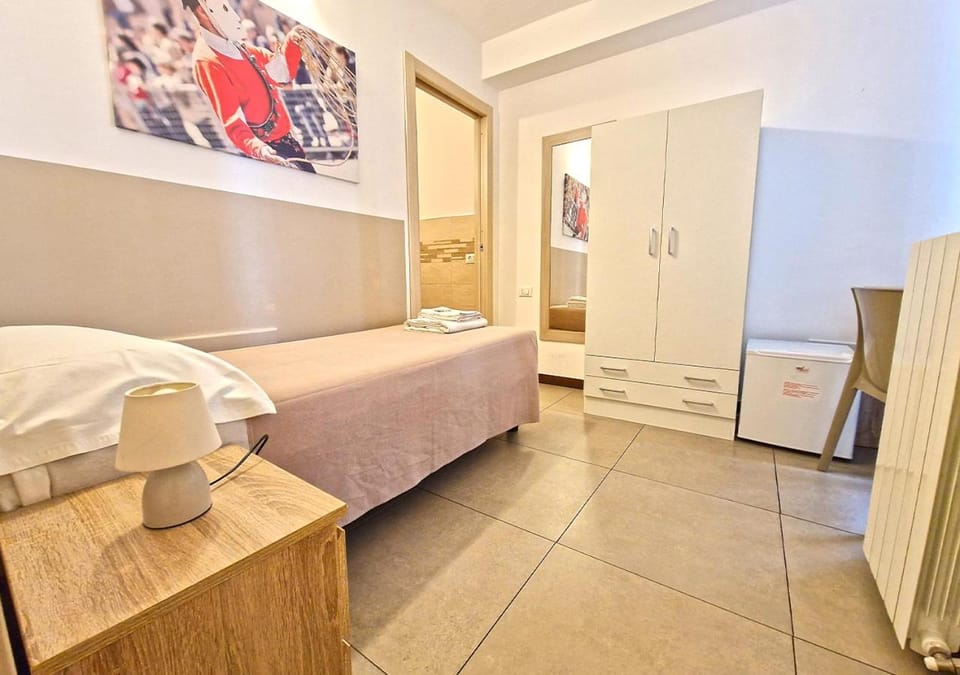Bed, Photo of the whole room, Bedroom, oven, towels, wardrobe