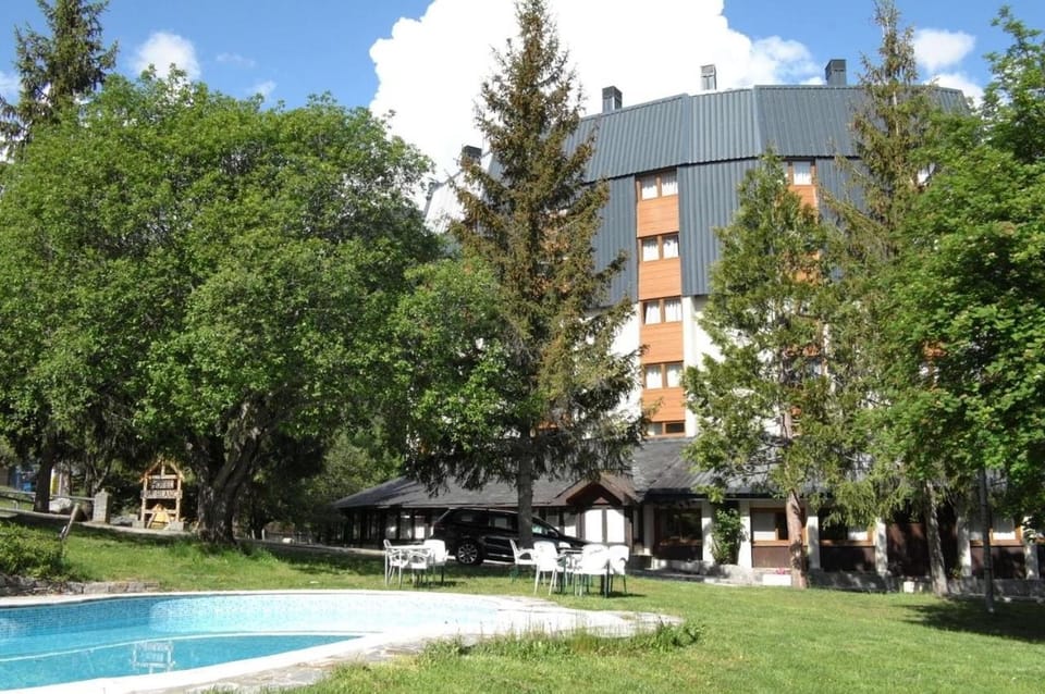 Property building, Facade/entrance, Garden, Swimming pool