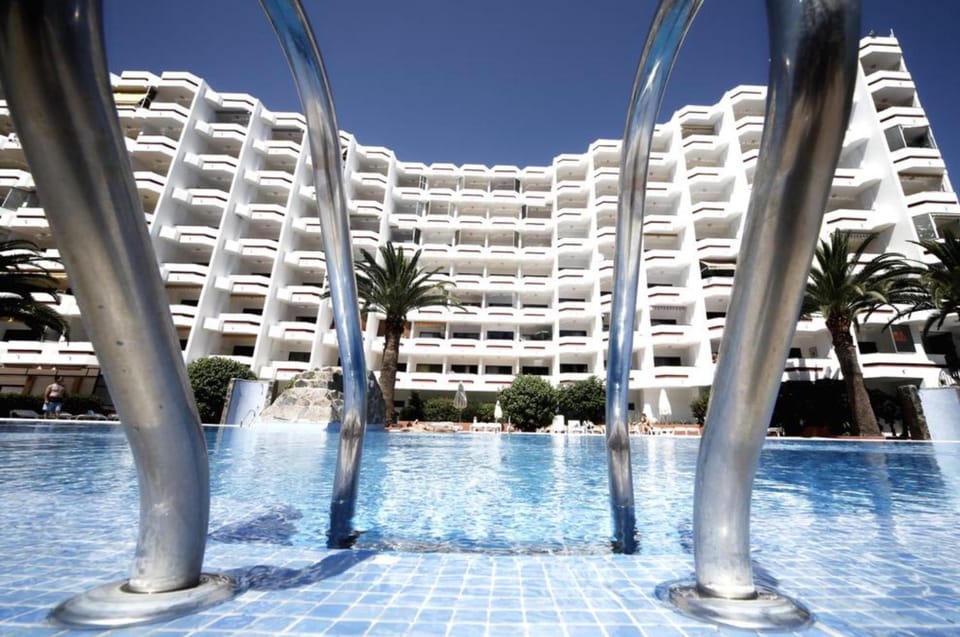 Property building, Pool view, Swimming pool, sunbed