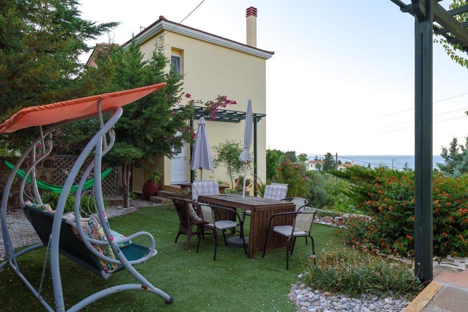 Property building, Patio, Natural landscape, Garden, View (from property/room), Dining area, Garden view