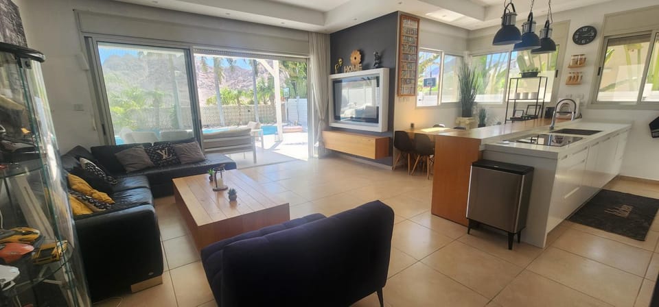 Living room, Seating area, Pool view, Entertainment, kitchen, kitchen