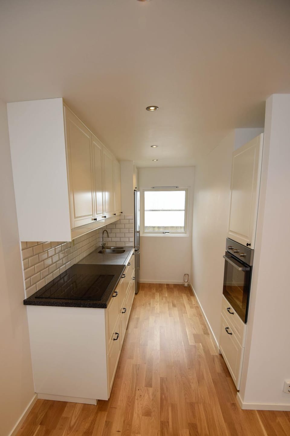 Kitchen or kitchenette, microwave, oven, stove
