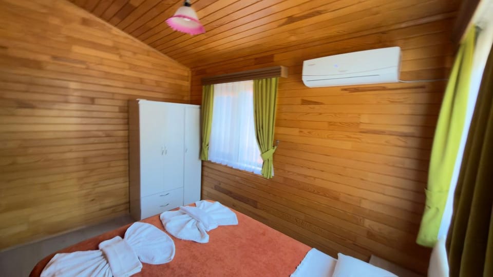 Bedroom, towels, wardrobe, air conditioner
