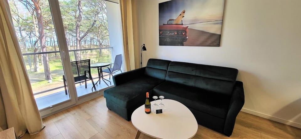 Communal lounge/ TV room, Living room, Seating area, Sea view