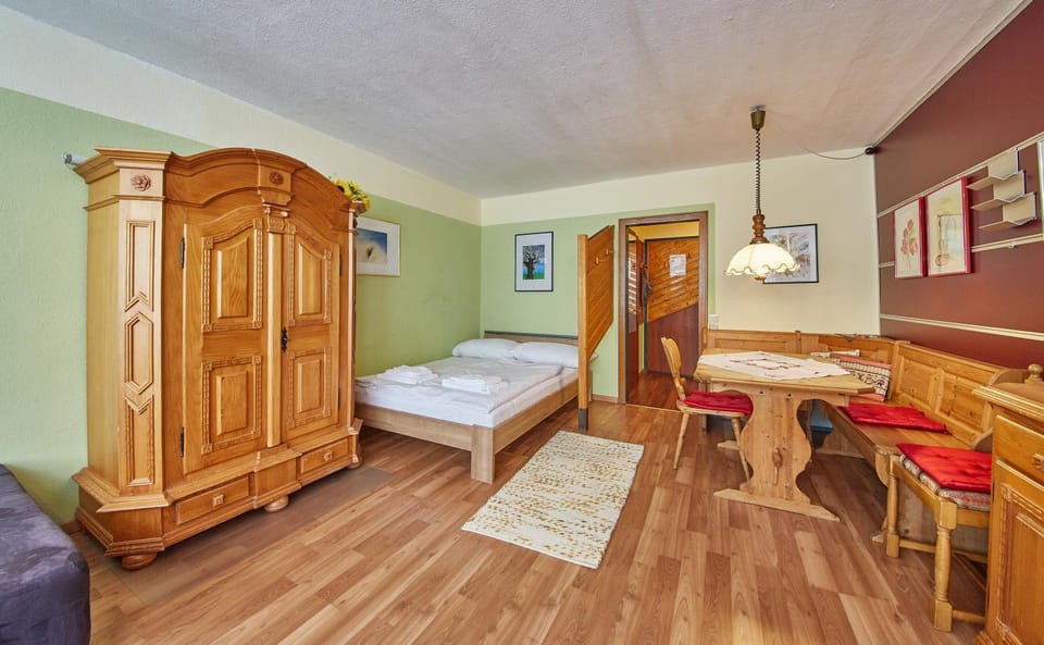 Bed, Living room, Seating area, Dining area, Bedroom