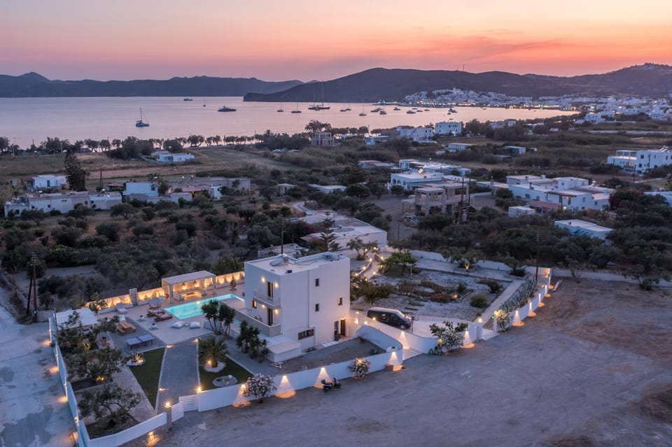 Property building, Nearby landmark, Neighbourhood, Natural landscape, Bird's eye view, Beach, Sea view, Sunset
