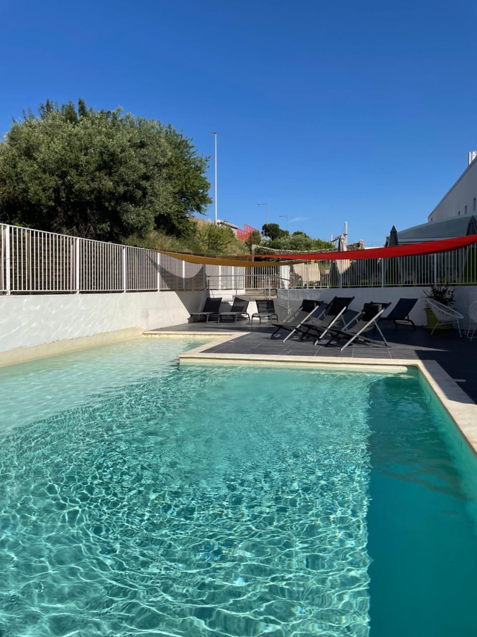 Swimming pool, sunbed