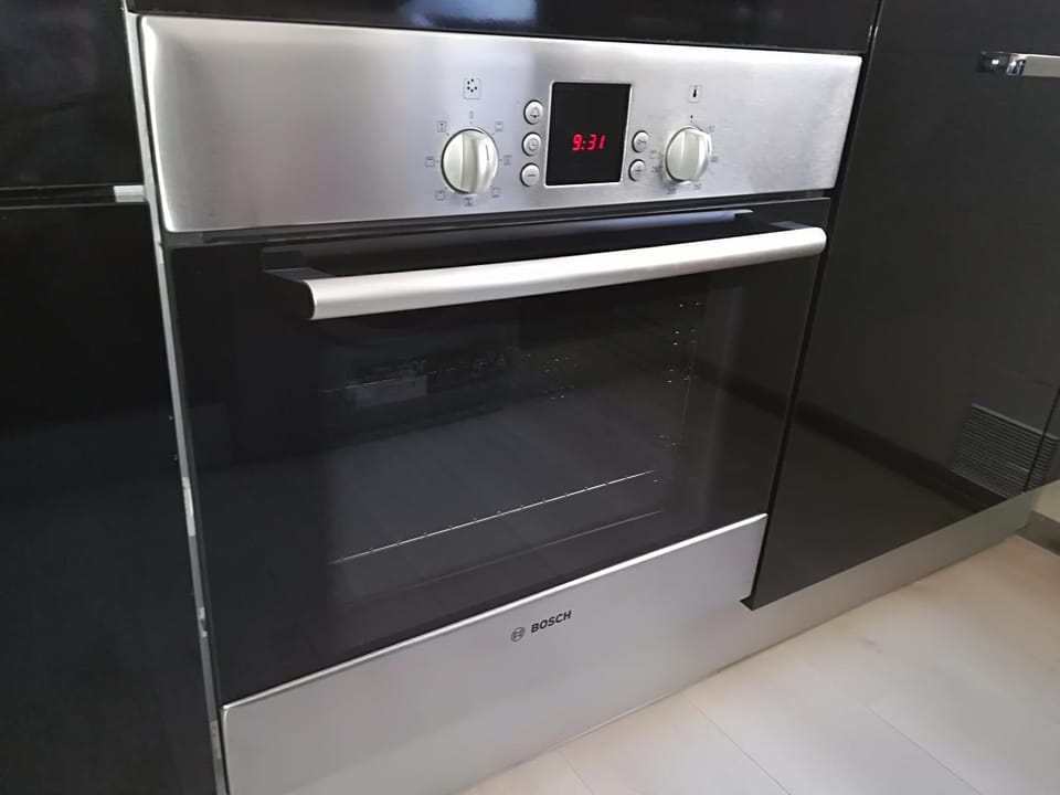 Kitchen or kitchenette, oven