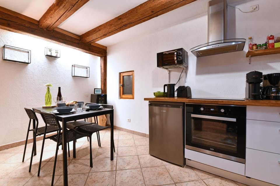 Kitchen or kitchenette, Dining area, dishwasher, oven, stove, toaster