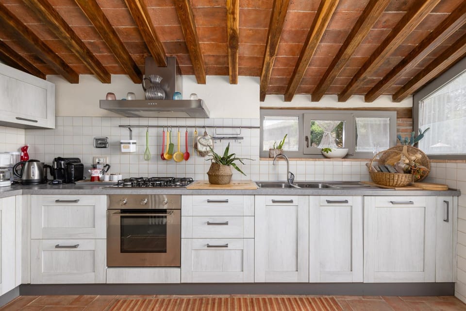 Kitchen or kitchenette, dishwasher, oven, stove, toaster
