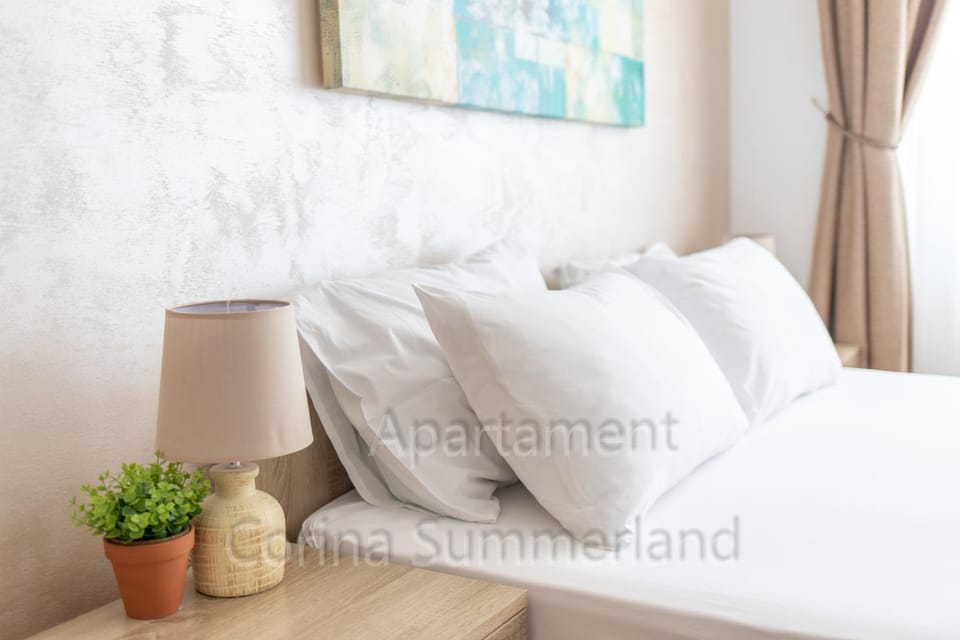 Bed, Property logo or sign, Bathroom, Bedroom