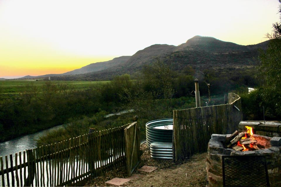 Nearby landmark, Natural landscape, BBQ facilities, Hot Tub, Mountain view, River view, Sunset