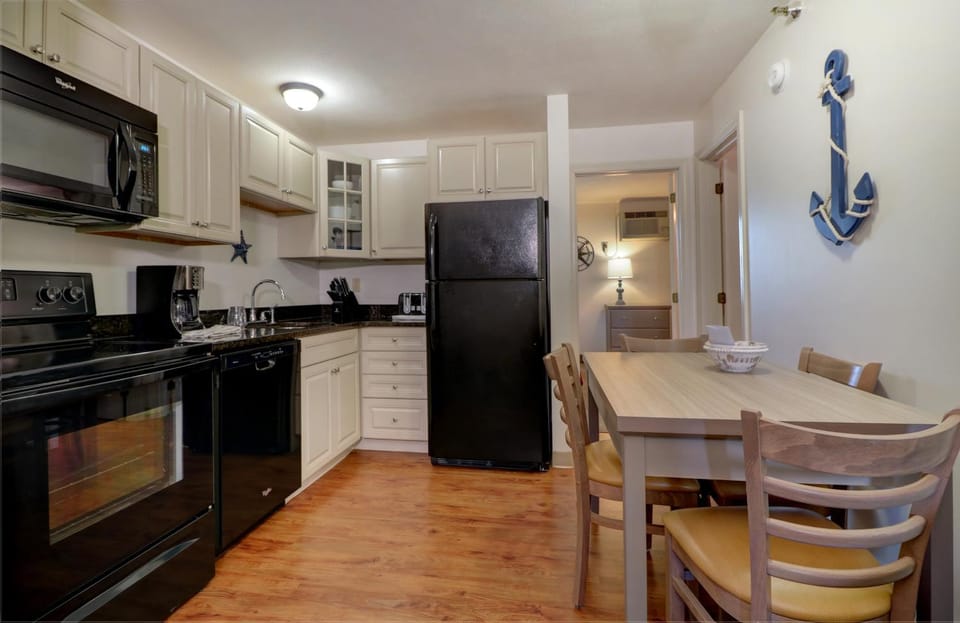 Kitchen or kitchenette, Dining area, dishwasher, oven, stove, toaster