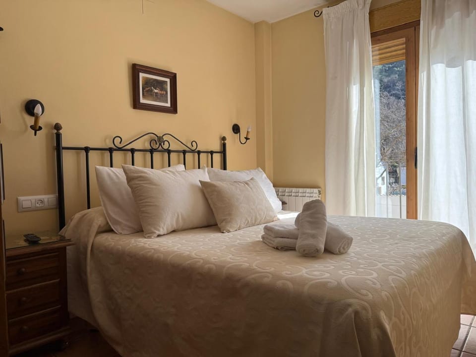 Bed, furniture, heating, towels, wardrobe