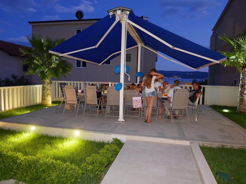 Patio, Night, People, Garden, Balcony/Terrace, group of guests