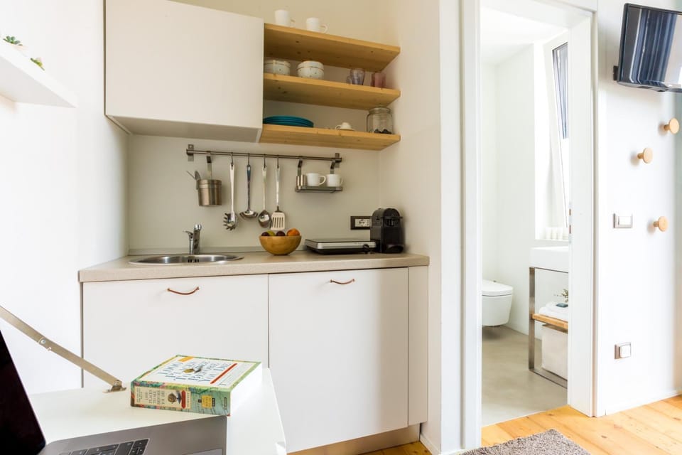 Tropical Micro Studio with Terrace and Duomo Views Apartment in Milan