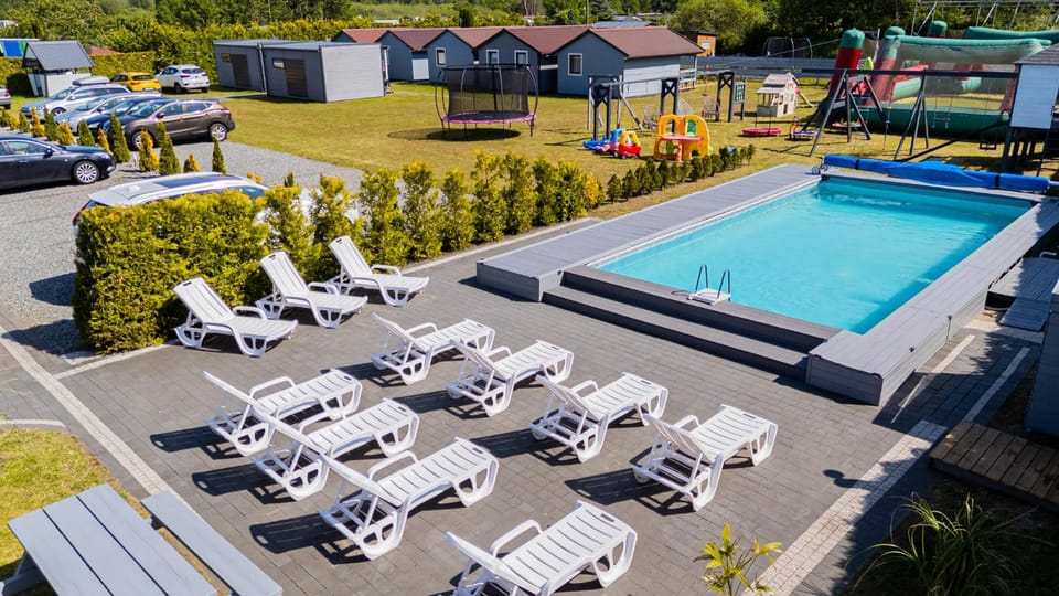 Property building, Pool view, Swimming pool, sunbed