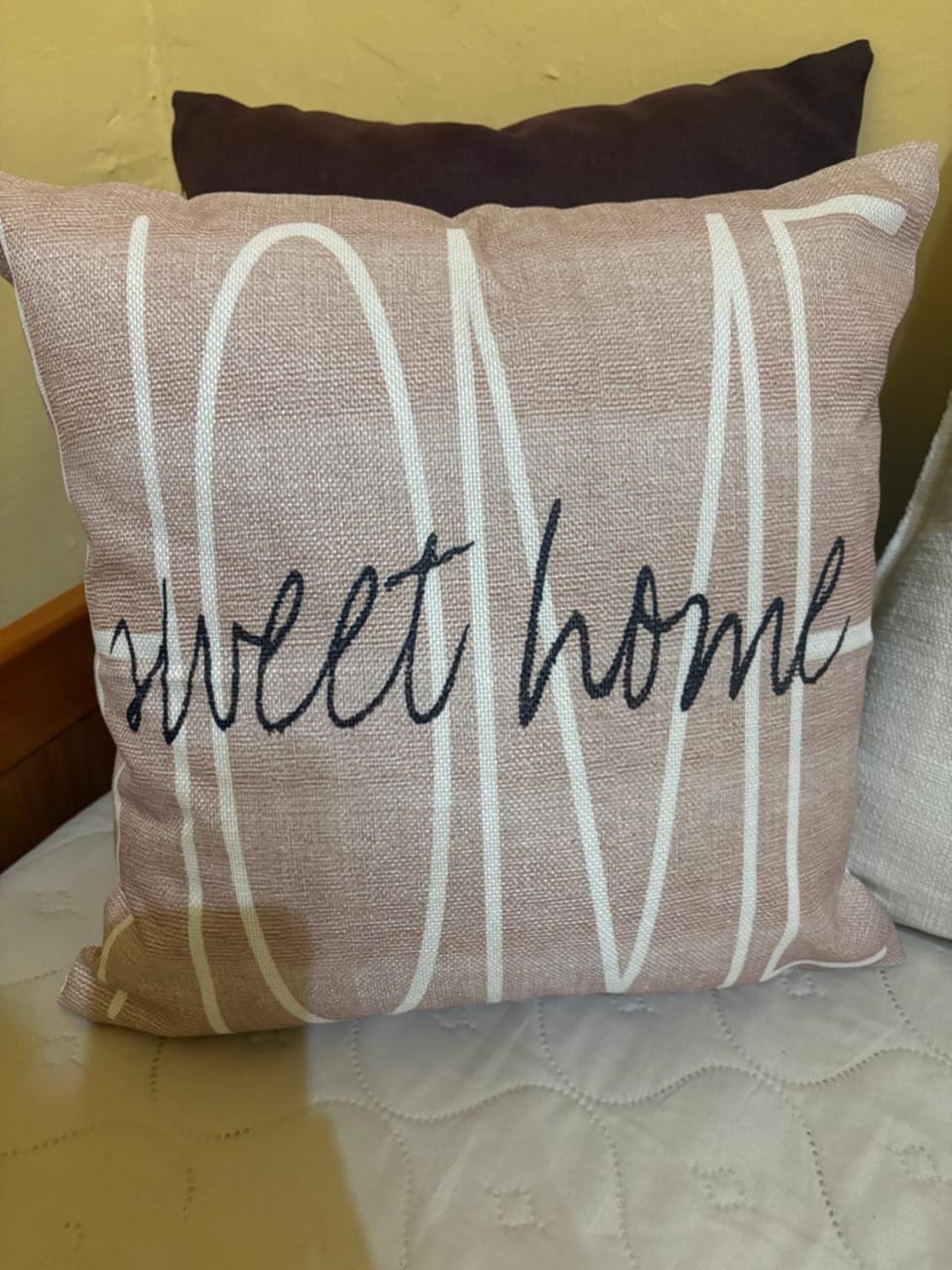 Bed, Photo of the whole room, Text overlay