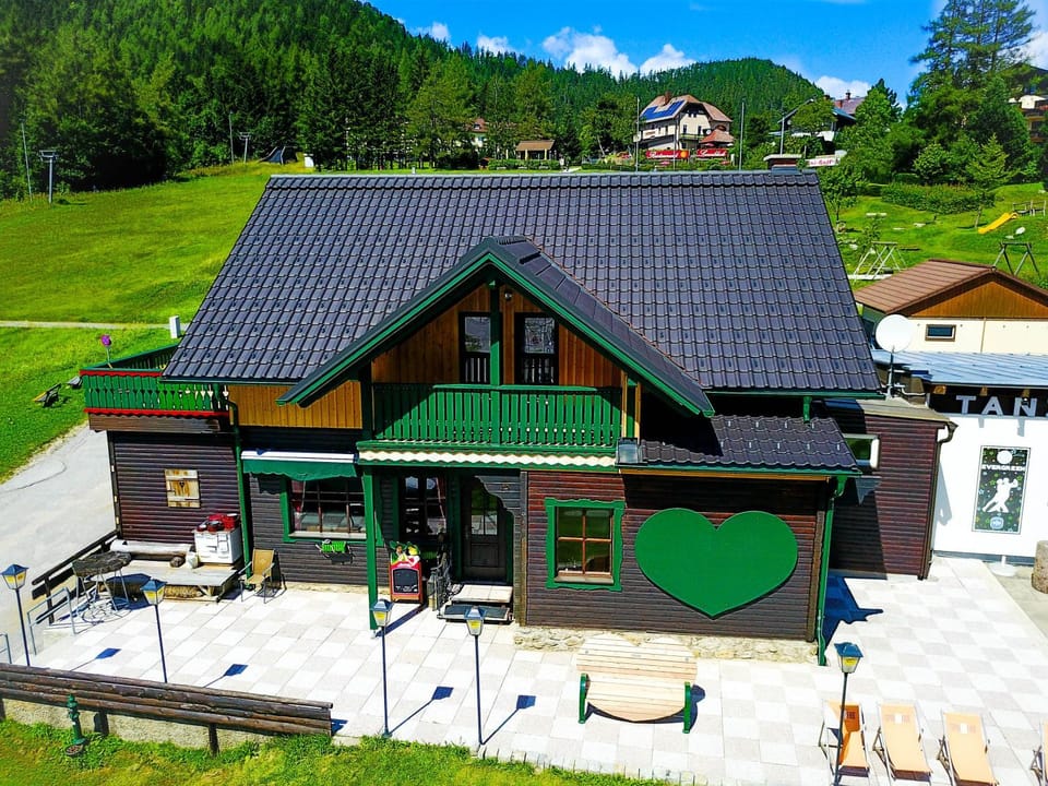 Property building, Restaurant/places to eat, Facade/entrance, Day, Summer, Balcony/Terrace, Balcony/Terrace