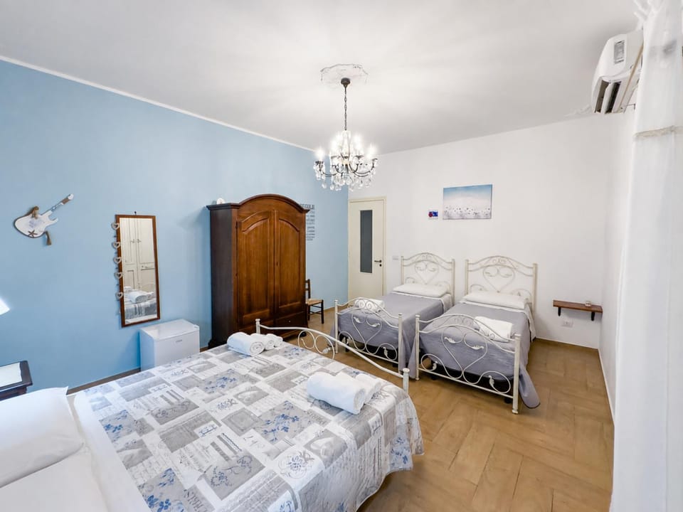 Bed, Photo of the whole room, Bedroom, towels, air conditioner