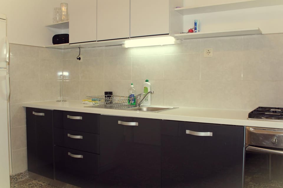 Kitchen or kitchenette, stove