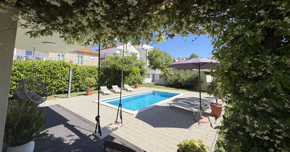 Property building, Day, Garden, Garden view, Pool view, Swimming pool, sunbed