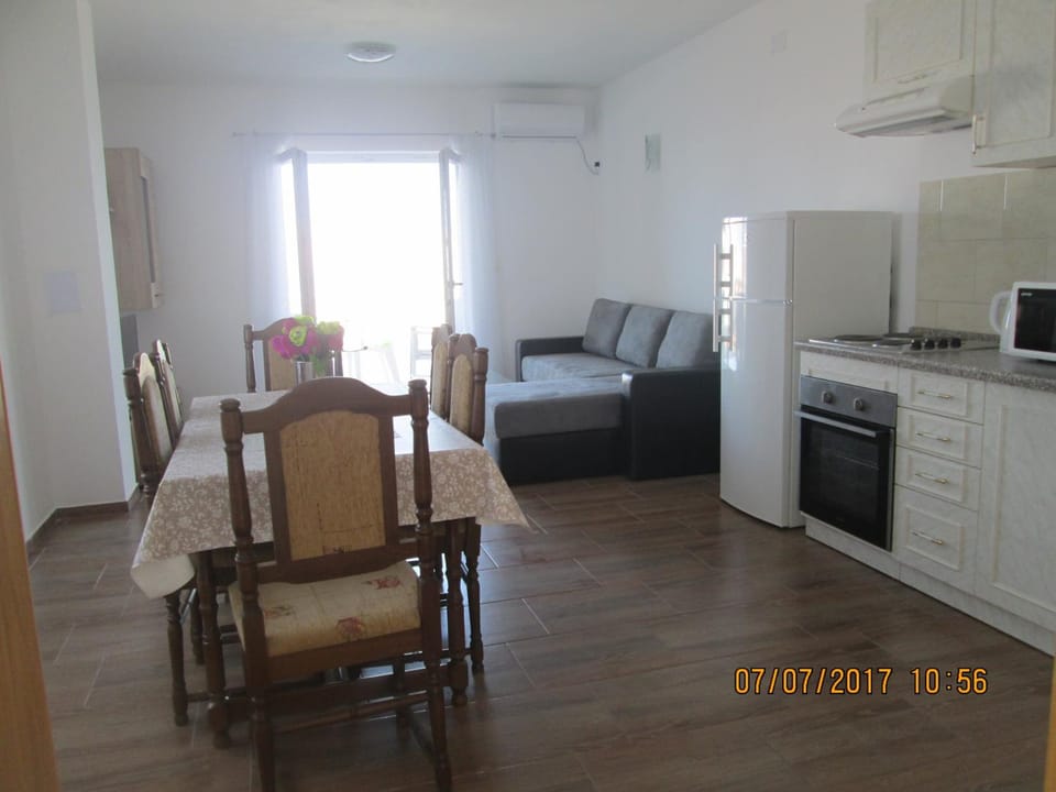 Kitchen or kitchenette, Living room, Dining area, Sea view