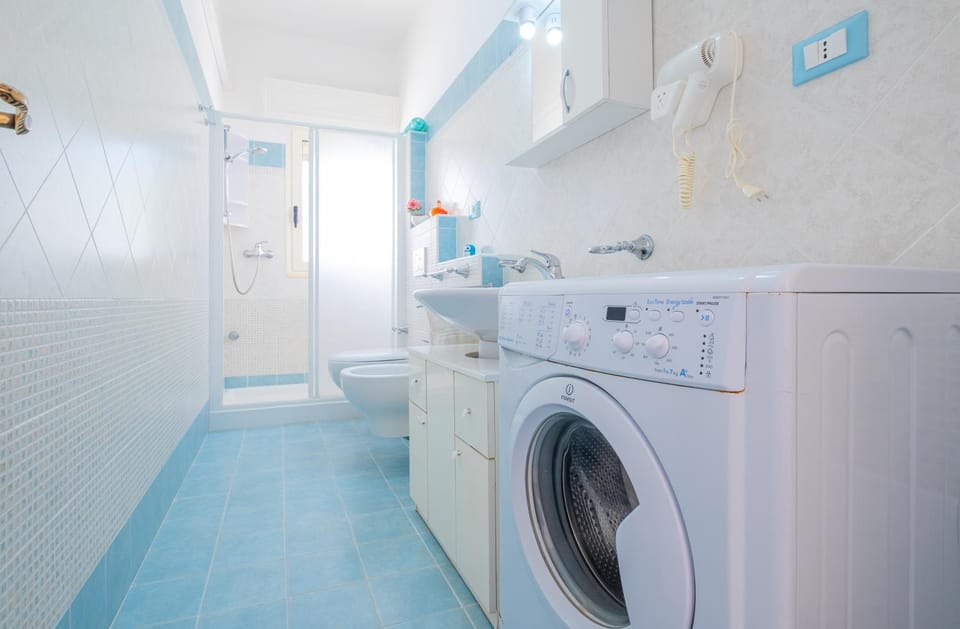Kitchen or kitchenette, dishwasher, washing machine, dryer