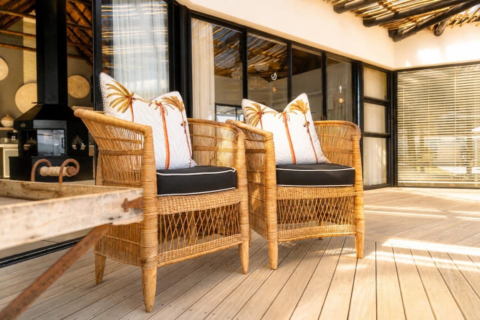 Property building, Patio, Decorative detail, Seating area