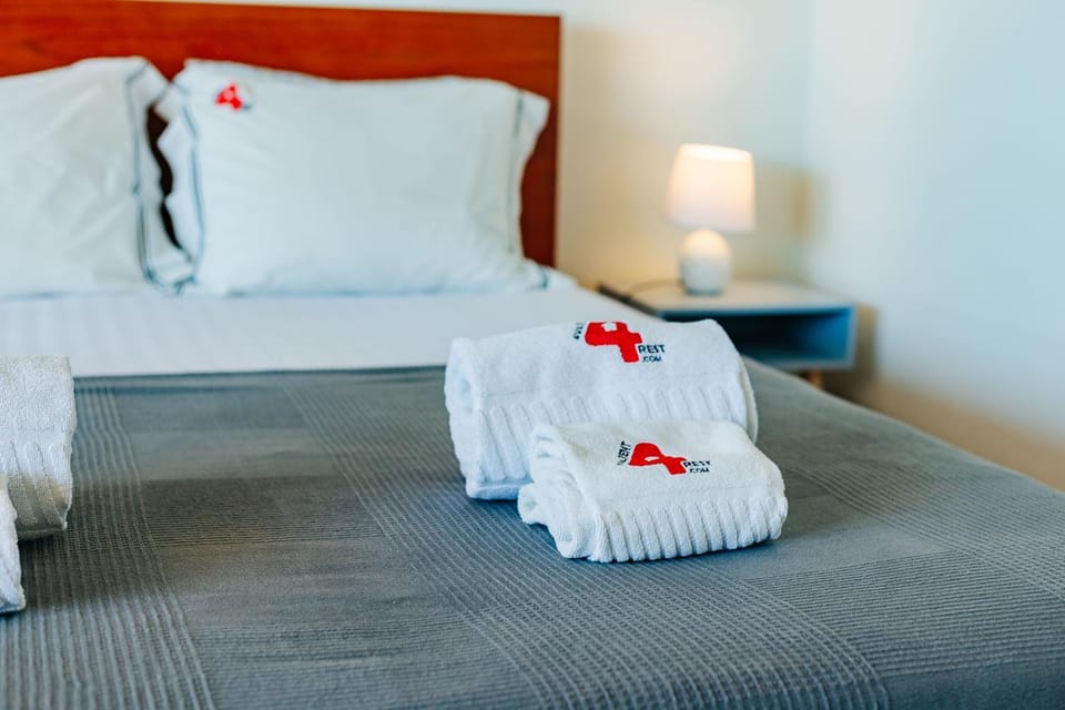 Bed, Photo of the whole room, Decorative detail, Bedroom, towels