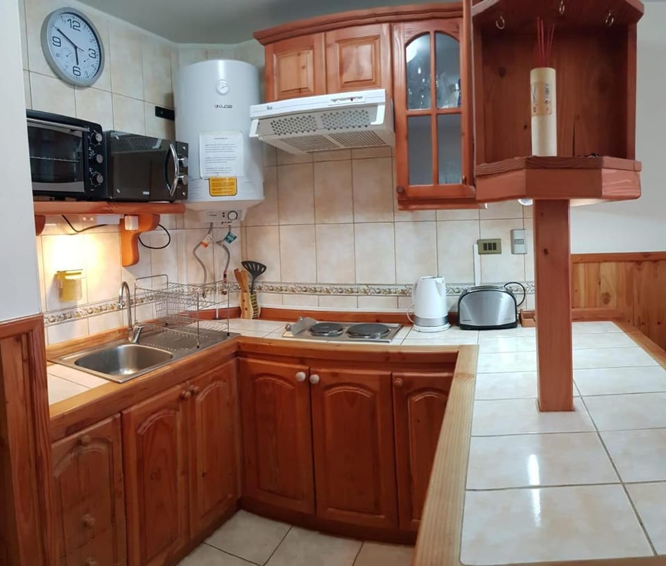 Kitchen or kitchenette, oven, toaster