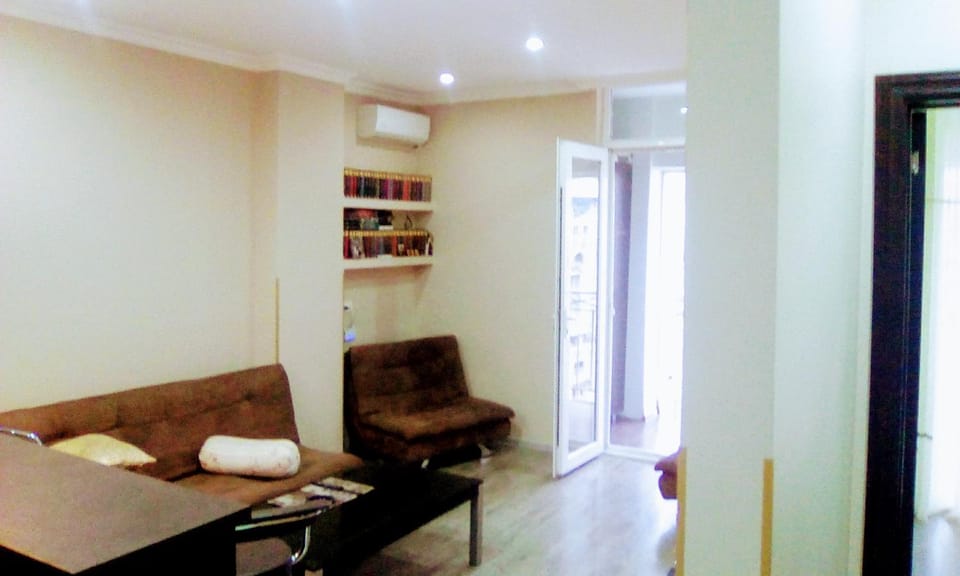 Communal lounge/ TV room, Bed, Seating area