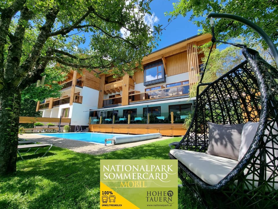 Property building, Garden, Logo/Certificate/Sign, Garden view, Pool view